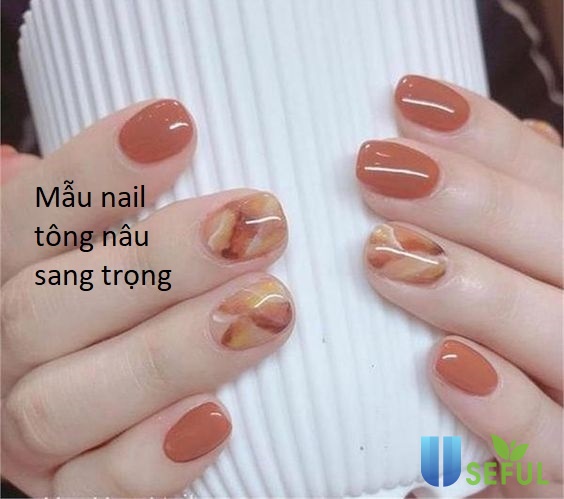 Bảng xếp hạng những mẫu nail màu nâu trầm sang trọng dành cho quý cô