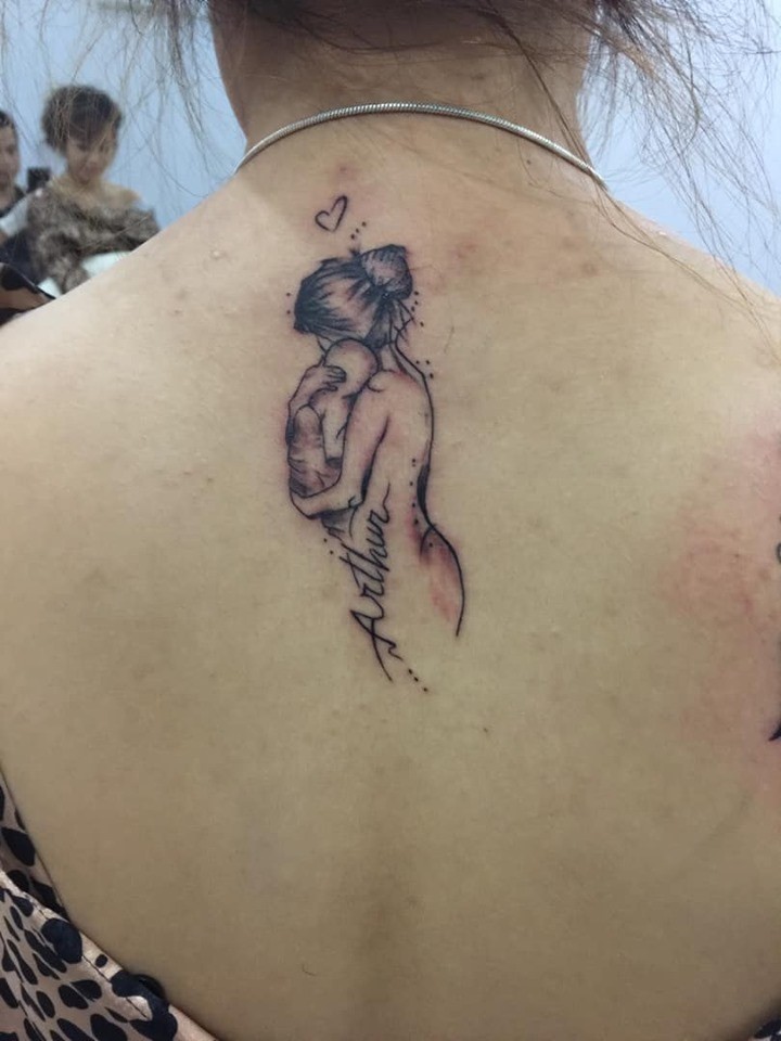 Hình Xăm Mẹ Bồng Con Tại Tuấn Tattoo - Royal Tattoo Studio 72 Nguyễn Trãi